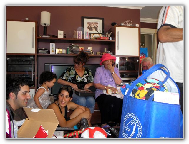 Opening presents SJ with her Mum & Dad Ebony Vanessa & Mario Xmas Day 2006